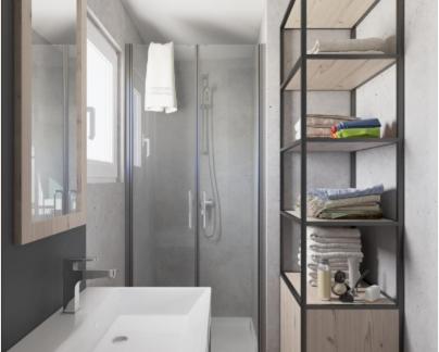 a bathroom with a shower and a sink and a mirror at Camping Nord in Klopein am Klopeiner See