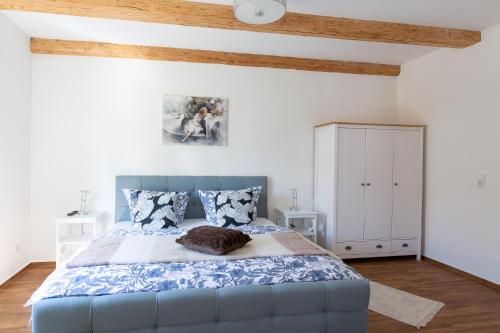 Ένα ή περισσότερα κρεβάτια σε δωμάτιο στο Lärchenhof Harz