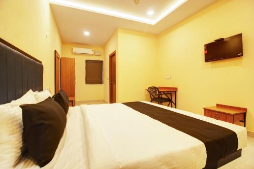 Afbeelding uit fotogalerij van Collection O MINT PARK HOTEL in Bālānagar