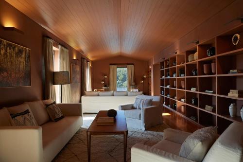 a living room with a couch and a table at Octant Douro in Castelo de Paiva