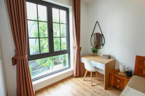 ハイフォンにあるMango Riverside Hotel & Apartment - Hai Phongのギャラリーの写真