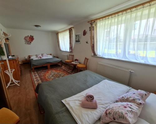 Postel nebo postele na pokoji v ubytování Ubytovanie Lienka