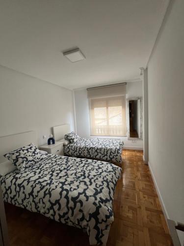 Katil atau katil-katil dalam bilik di 803A Bonito apartamento en Luarca