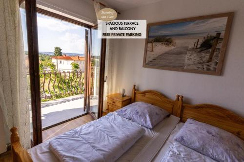 Postel nebo postele na pokoji v ubytování Apartment Stefanija