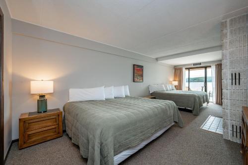a hotel room with two beds and a window at 101B One Bedroom One Bath in Oakland