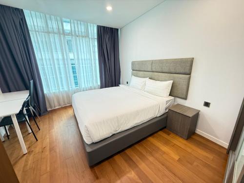 Ліжко або ліжка в номері vortex suits klcc by Bond