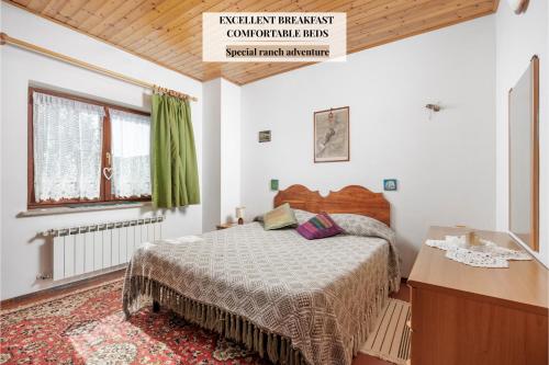 Ένα ή περισσότερα κρεβάτια σε δωμάτιο στο Ranč Katja in Abdul