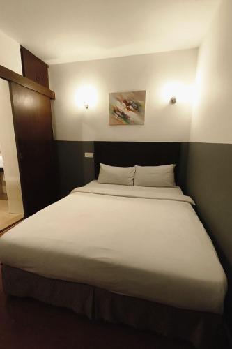 Ένα ή περισσότερα κρεβάτια σε δωμάτιο στο Hotel D'New 1 KK Sabah