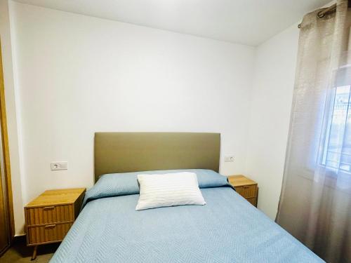 Ένα ή περισσότερα κρεβάτια σε δωμάτιο στο VUT La Ermita