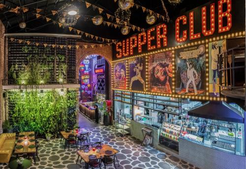 a restaurant with a sign that reads super club at Gaas BaasCo in Kathmandu