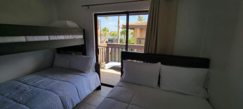 Ένα ή περισσότερα κρεβάτια σε δωμάτιο στο Tiki Condo 261