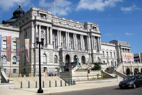 a large building with a car parked in front of it at DC Studio Near Capitol & Metro - Parking Included in Washington, D.C.