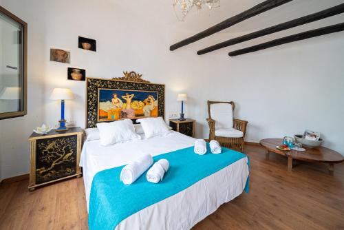 Ένα ή περισσότερα κρεβάτια σε δωμάτιο στο Casa de Hilario