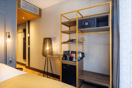 Postel nebo postele na pokoji v ubytování Hotel Die Port van Cleve