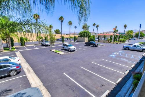an aerial view of a parking lot with cars parked at Motel 6-Menifee, CA in Menifee