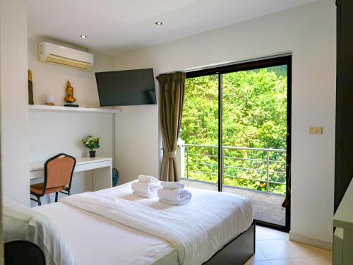 Ένα ή περισσότερα κρεβάτια σε δωμάτιο στο Chaweng Hill 2br & Private Pool