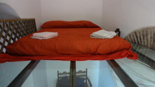 Katil atau katil-katil dalam bilik di Torrione San Lorenzo I