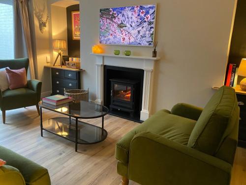 TV a/nebo společenská místnost v ubytování Garden Flat