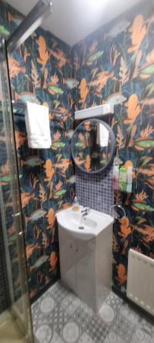a bathroom with a sink and a mirror at Studio No4, Cockermouth The Lakes in Cockermouth