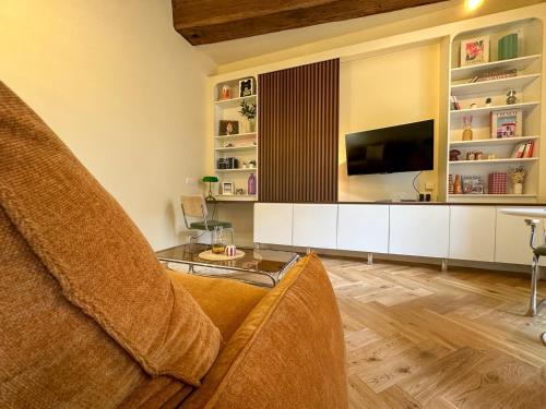 TV a/nebo společenská místnost v ubytování L'Atelier Nova