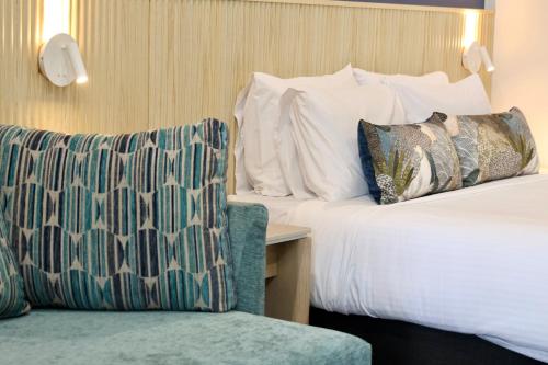 Cama o camas de una habitación en Nightelier Mission Beach