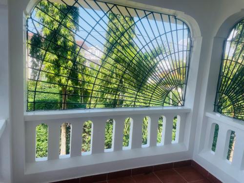 a window with a view of a glass ceiling at Nyali one bedroom Villa- Subree Luxury in Mombasa