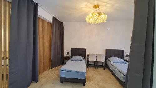 Ένα ή περισσότερα κρεβάτια σε δωμάτιο στο Gästehaus Wohnung #1