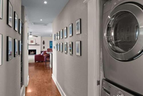 a hallway with a washing machine in a room at Red Rock Retreat with Amazing Patio and Hot Tub for family in Sedona