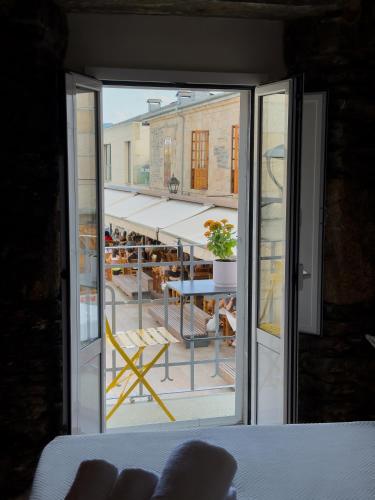 Ένα ή περισσότερα κρεβάτια σε δωμάτιο στο Go Compostela Apartamento 4 pax