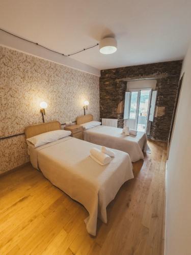 Ένα ή περισσότερα κρεβάτια σε δωμάτιο στο Go Compostela Apartamento 4 pax