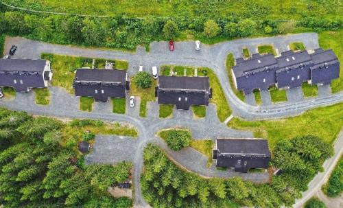 an overhead view of a parking lot with buildings at Tahko North Lodge B 5 in Kuopio