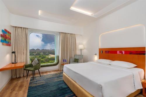 Postel nebo postele na pokoji v ubytování Park Inn by Radisson New Delhi IP Extension
