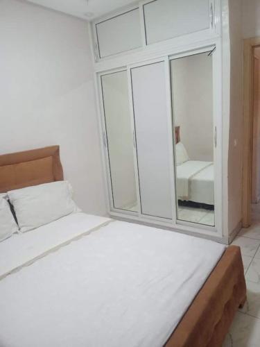 Katil atau katil-katil dalam bilik di Appartement moderne et confortable proche plages