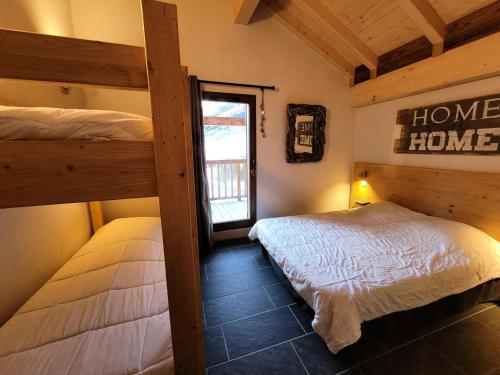 Ένα ή περισσότερα κρεβάτια σε δωμάτιο στο Résidence Le Criterium - Résidence Le Critérium 3Chalet E Appartement 8 MAE-1903