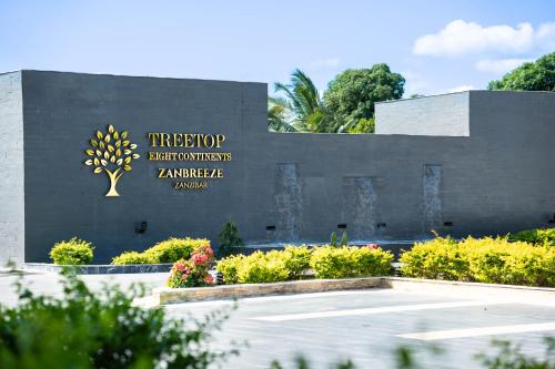 a building with a sign that reads therop internationalamidate at Treetop by Eight Continents, Zanzibar in Mchangani