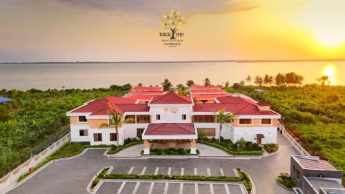 an aerial view of a house with red roofs at Treetop by Eight Continents, Zanzibar in Mchangani