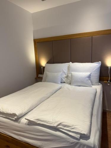 Katil atau katil-katil dalam bilik di Fókusz Apartman Kőszeg