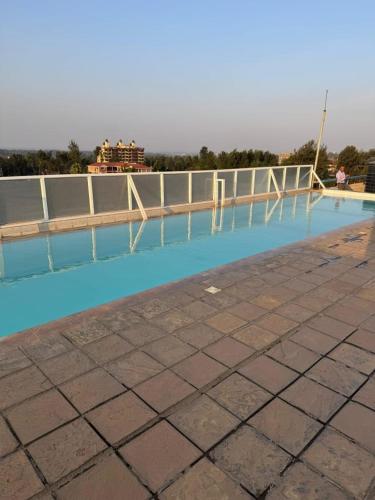 Bazén v ubytování Modern & Cozy Studio with SWIMMING POOL nebo v jeho okolí