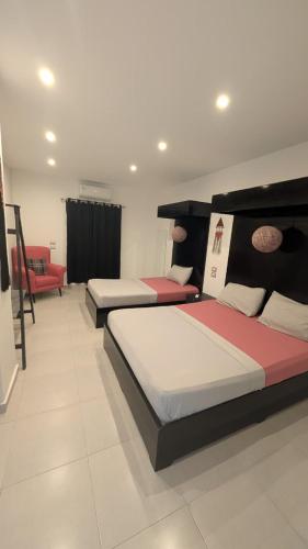 Katil atau katil-katil dalam bilik di Hostify Hostel