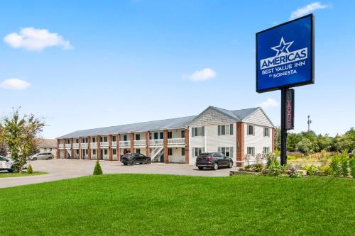a building with a sign in front of it at Americas Best Value Inn Biddeford in Biddeford