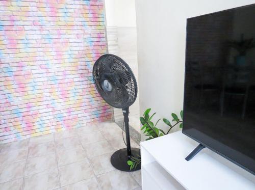 Televisyen dan/atau pusat hiburan di Cantinho Azul do Sol