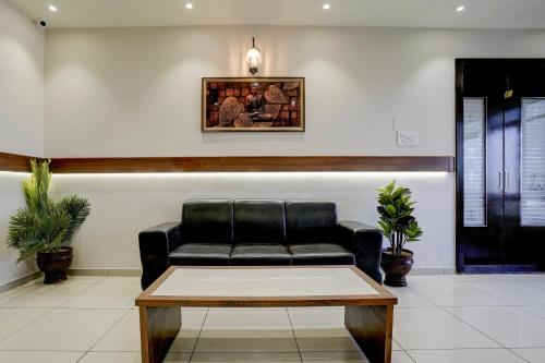 Χώρος καθιστικού στο Super Hotel O DH