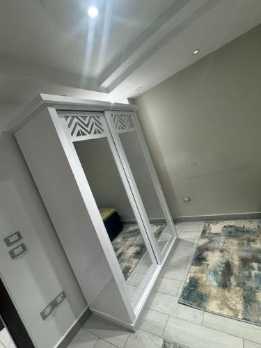 an empty room with a staircase in a house at اكتوبر الحصري 6 October in 6th Of October