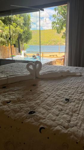 Ένα ή περισσότερα κρεβάτια σε δωμάτιο στο Vila Cangaço