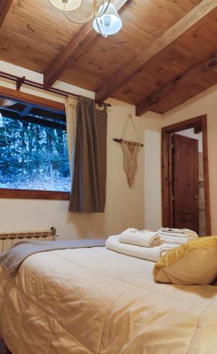 Llit o llits en una habitació de Paso Puyehue