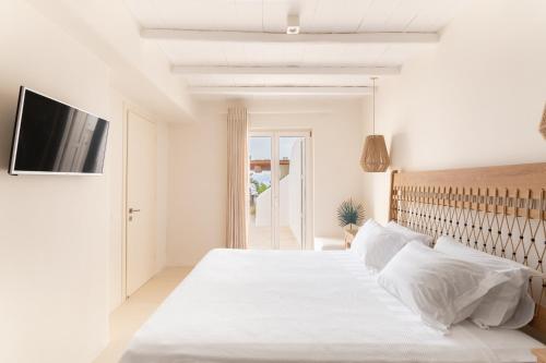 Postel nebo postele na pokoji v ubytování Blue Diamond BESTOFMIKONOS