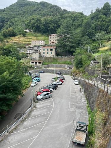 a bunch of cars parked in a parking lot at Le Prunache in Stazzema