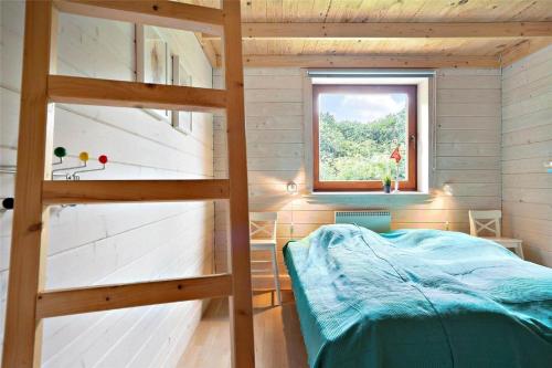 Ένα ή περισσότερα κρεβάτια σε δωμάτιο στο 40506-Juelsminde-Pot-Strandby-314