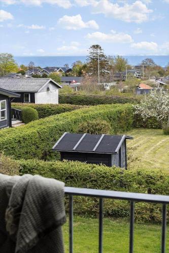 a view of a house with solar panels on it at 30467-Odder-Ravnsager-15 in Odder