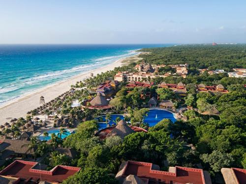 an aerial view of a resort and the beach at Iberostar Waves Quetzal - All Inclusive in Playa del Carmen